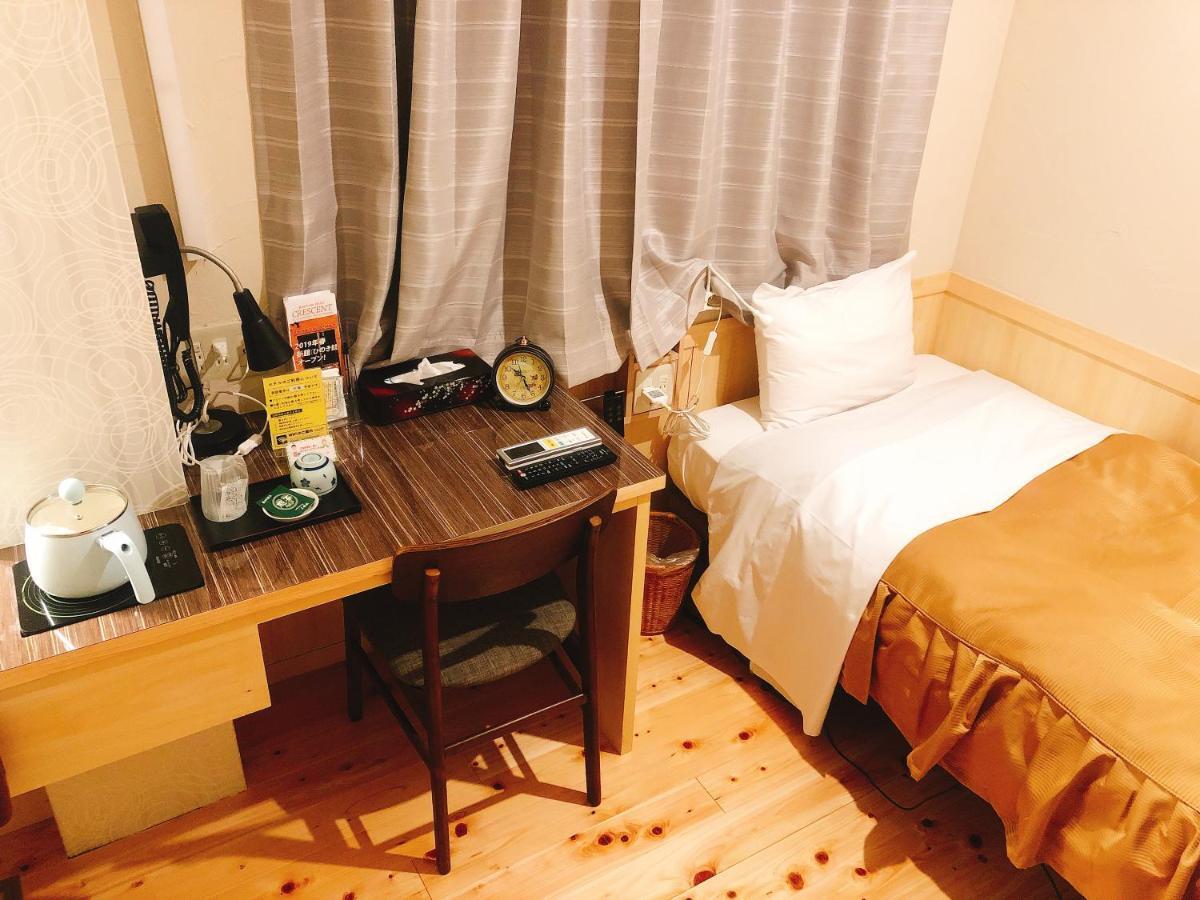 Business Hotel Crescent Токио Экстерьер фото