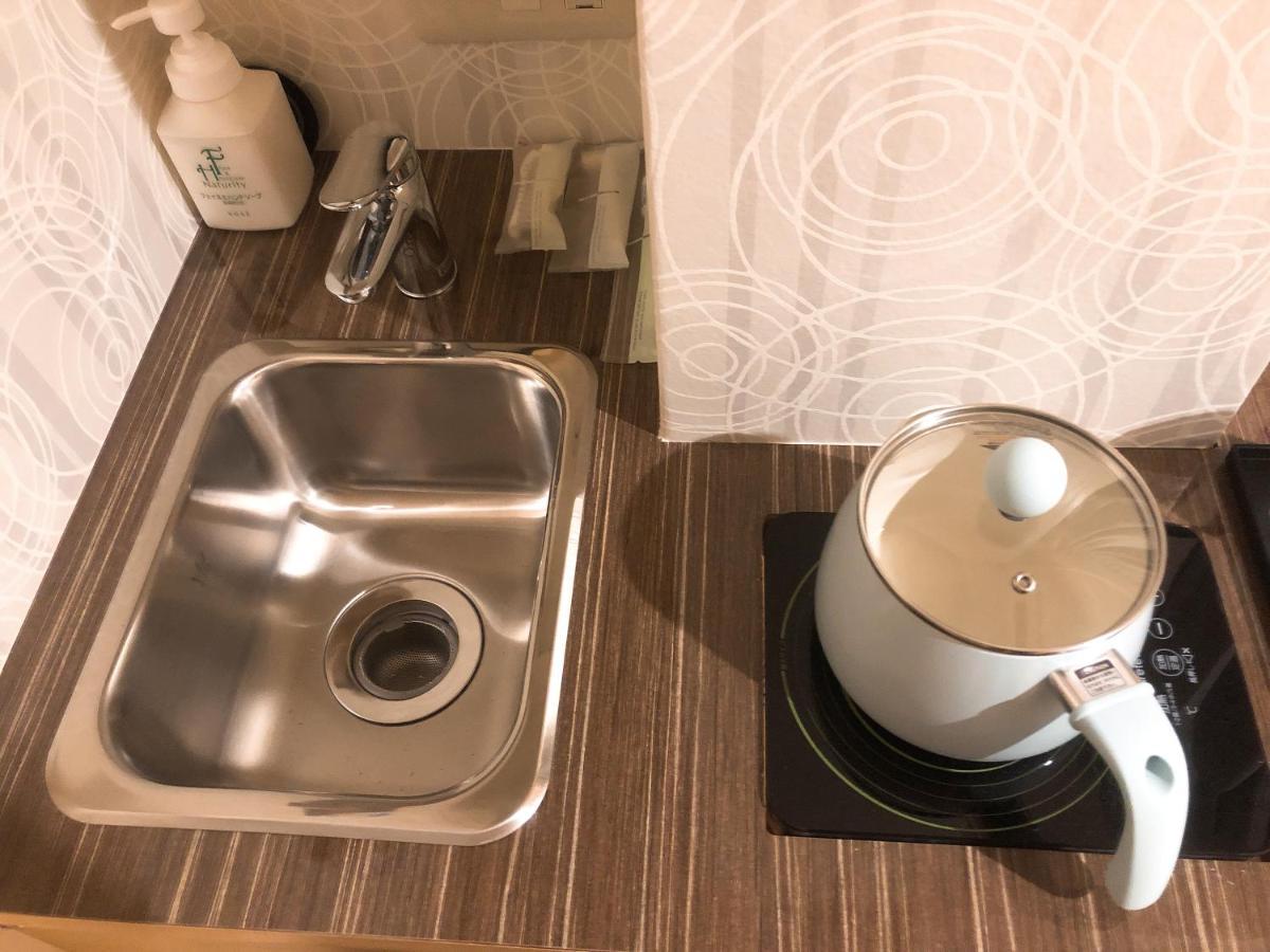 Business Hotel Crescent Токио Экстерьер фото