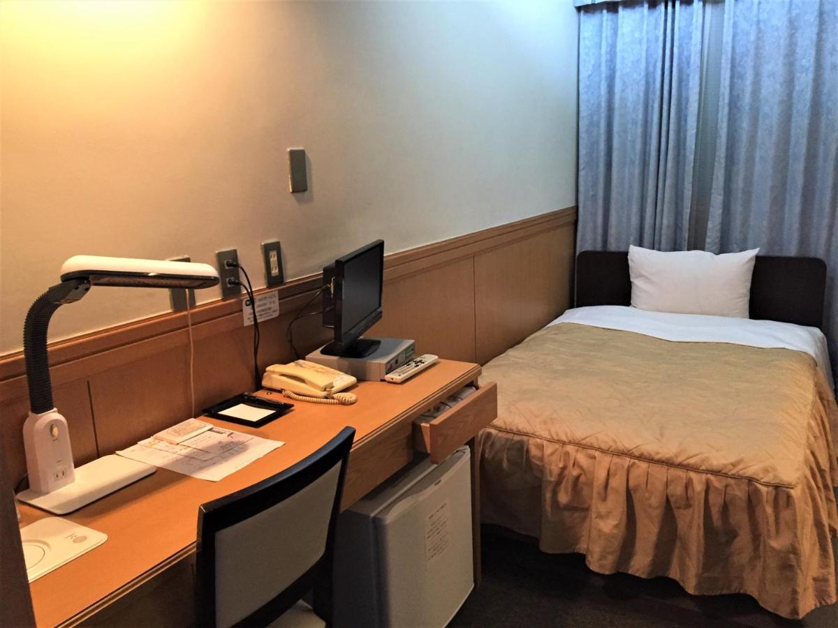Business Hotel Crescent Токио Экстерьер фото